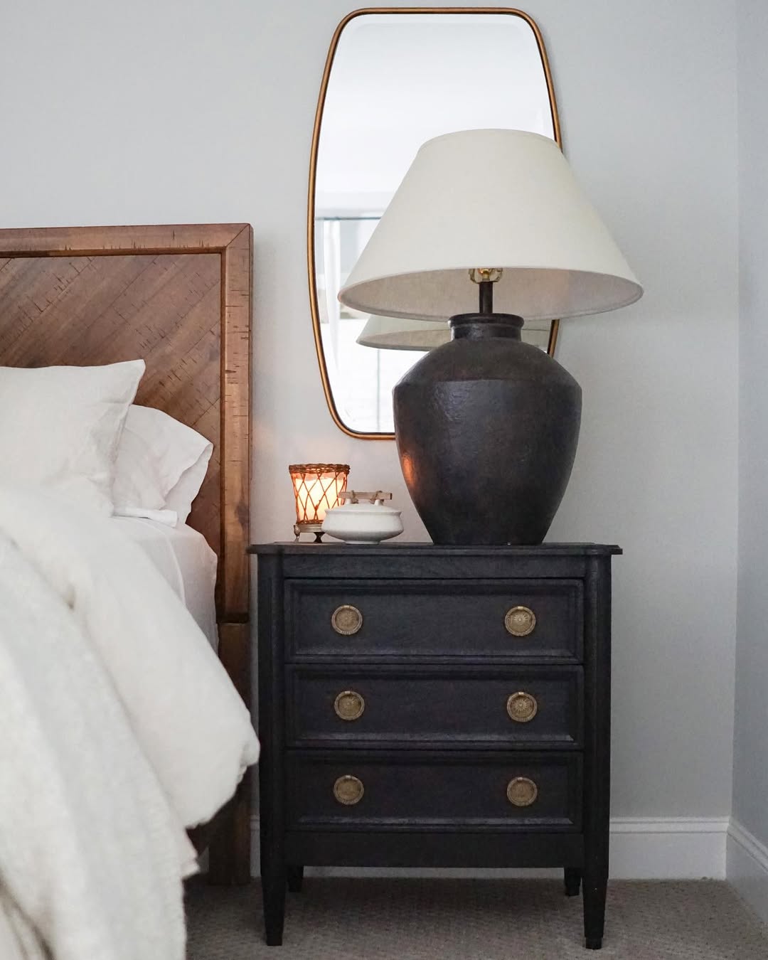 Black Chest and Hammered Lamp