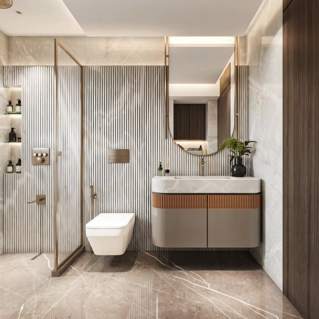 Fluted White Panel and Marble Bathroom with Brushed Gold Fixtures