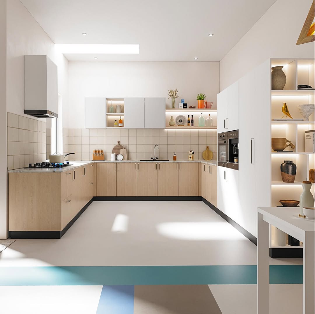 Modern kitchen featuring light wood lower cabinets, white uppers, built-in appliances, open shelves with decor, and ample lighting. Embrace Kitchen Color Trends for 2025 in this stylish space filled with natural and spot lighting.