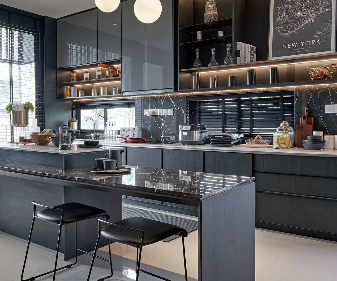 Modern kitchen with dark cabinets, marble countertops, bar stools, built-in appliances, and open shelving—a perfect example of stunning kitchens embracing black and grey kitchen color ideas for a sleek, minimalist look.