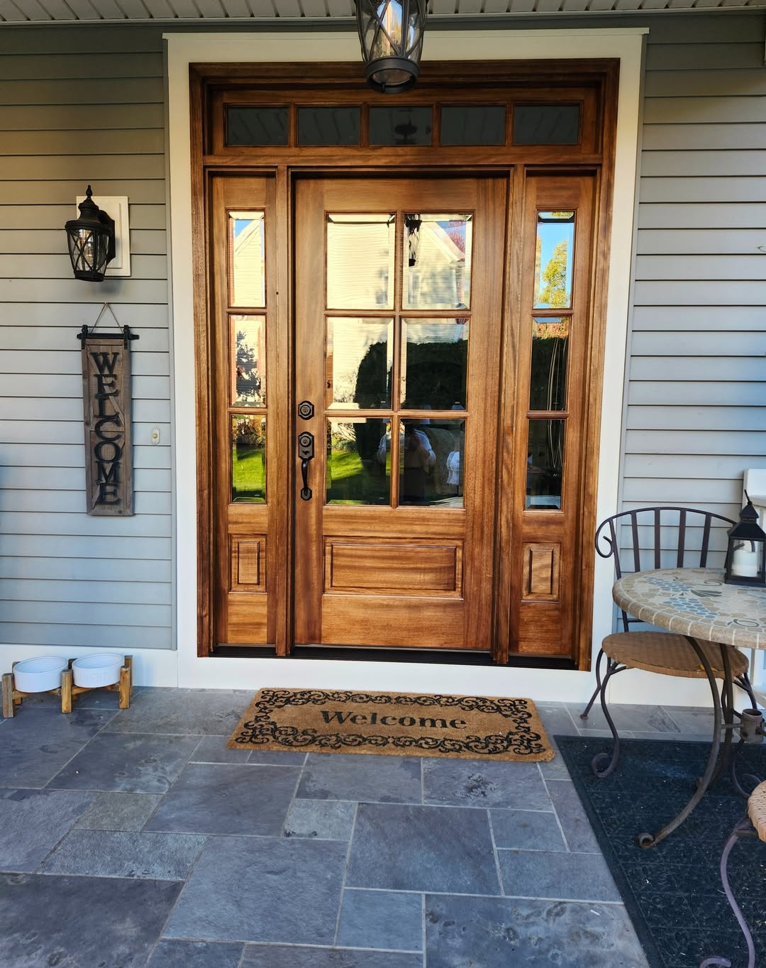 A double door entryway with glass panels, a