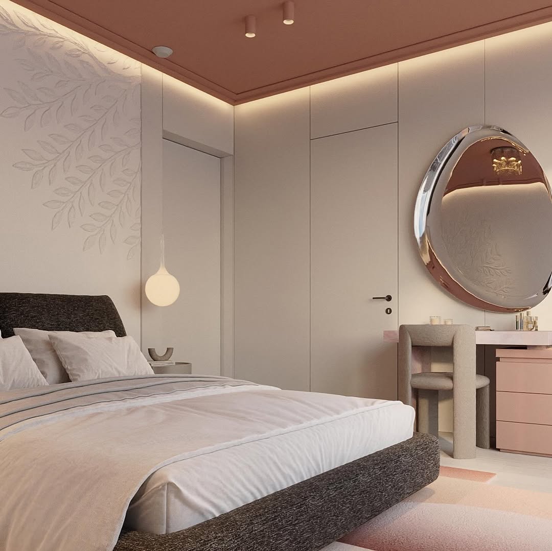 Modern bedroom design with a large bed, minimalist furniture, an oval mirror above a vanity, soft lighting, and subtle leaf-patterned wall decor—perfect inspiration for women bedroom ideas.